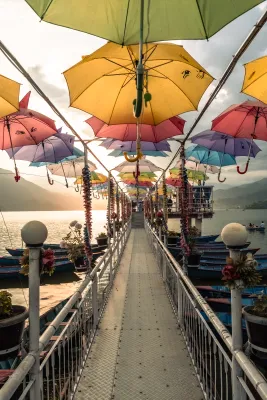 Umbrellas Over the Jetty, Phewa Lake